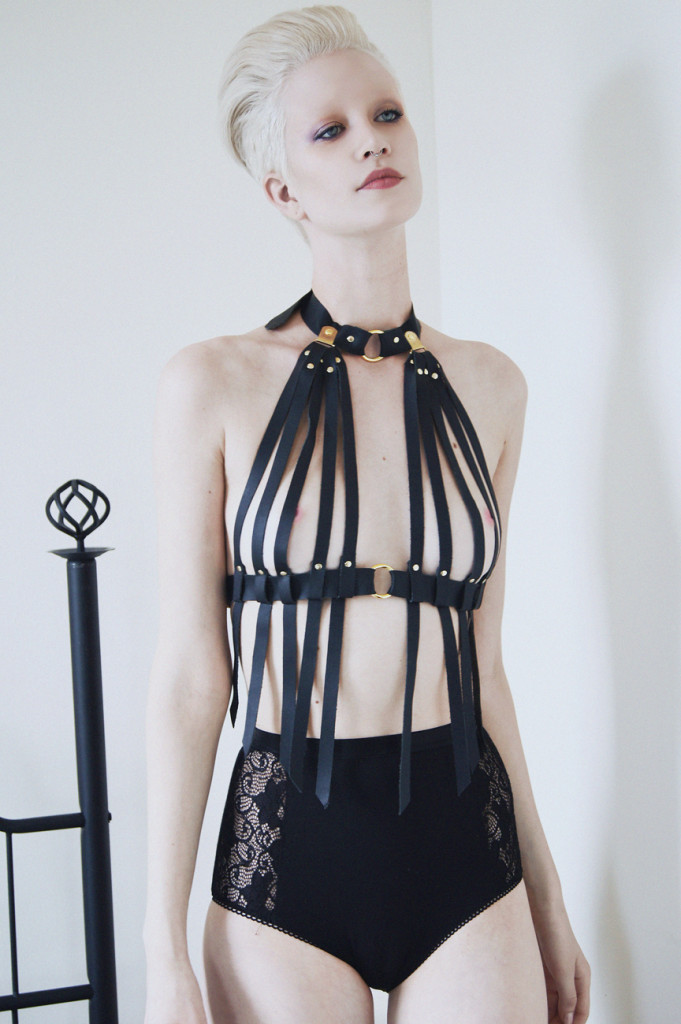 love lorn lingerie, leather harness, strappy bra, leather fringe, burning man, high neck bra, lacy brief, bondage, bdsm, minimalist photography, natural light, gothic fashion, sexy lingerie